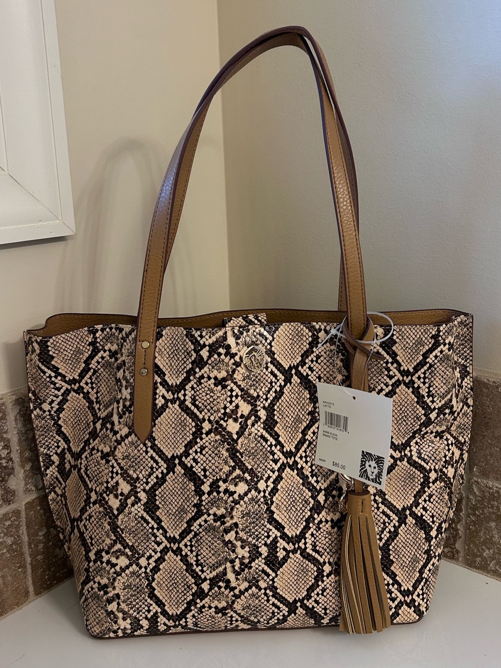 Anne Klein Snake-Print Tote in Latte with Tan Trim and Tassel